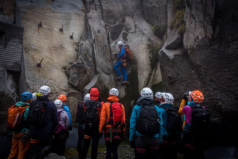 Mammut Alpine school guides showing participants the cable clip points