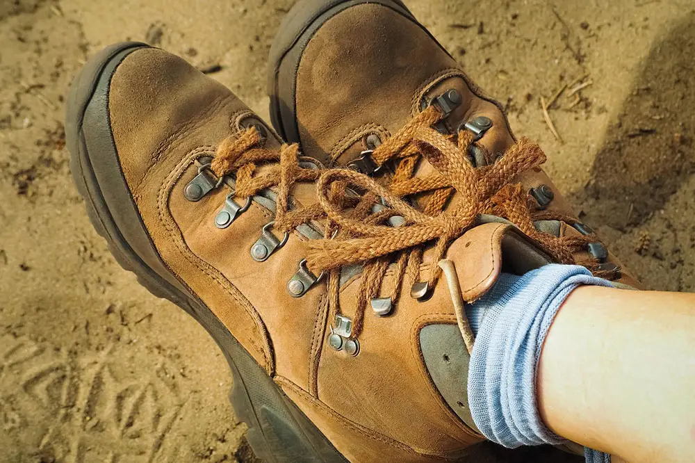 Light, low‑volume socks pair well with snug trail shoes in warm weather