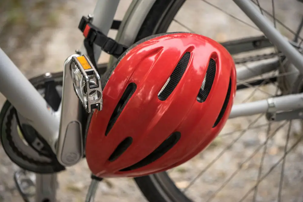 bike helmet hanging on a bike