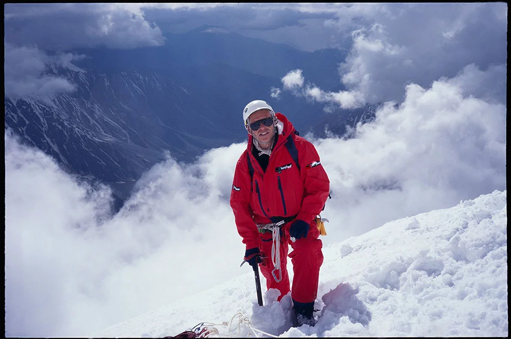 Above the clouds. Wearing Hinkes suit specially designed oversuit for high altitude climbing