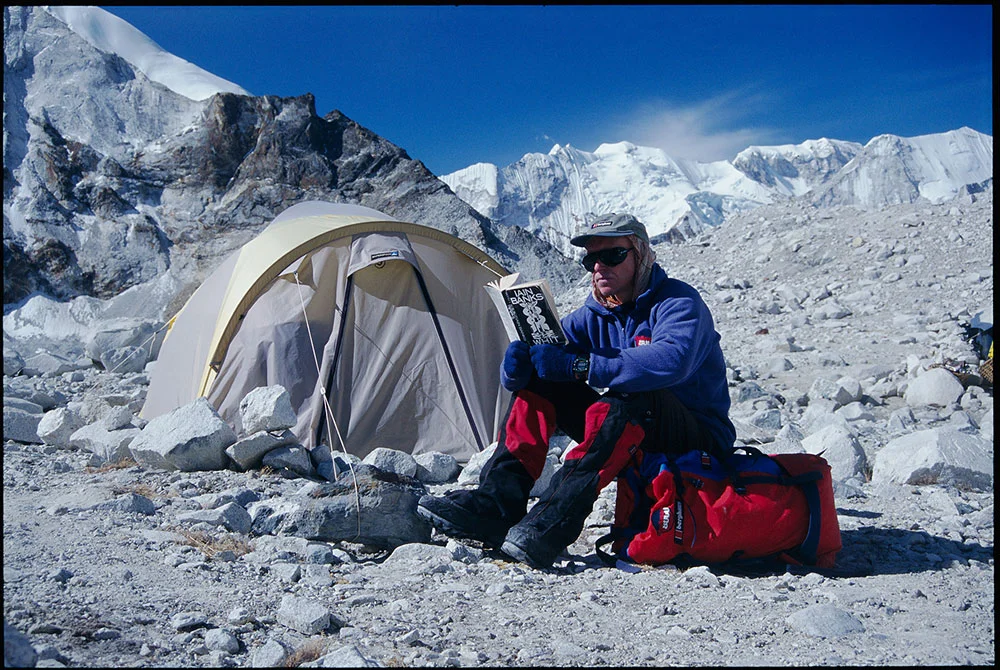At Base Camp reading a book
